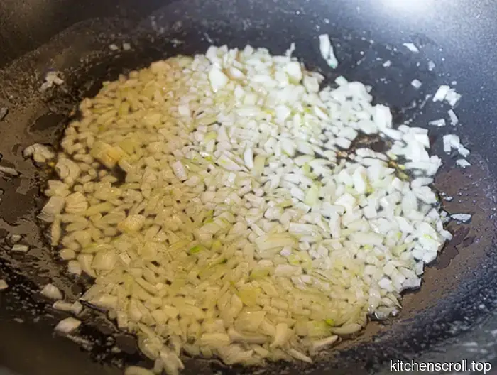 Pasta in green cream sauce with peas and spinach on the Delicious Blog
