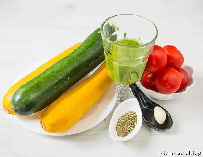 Summer zucchini salad with tomatoes and pesto on the Delicious Blog
